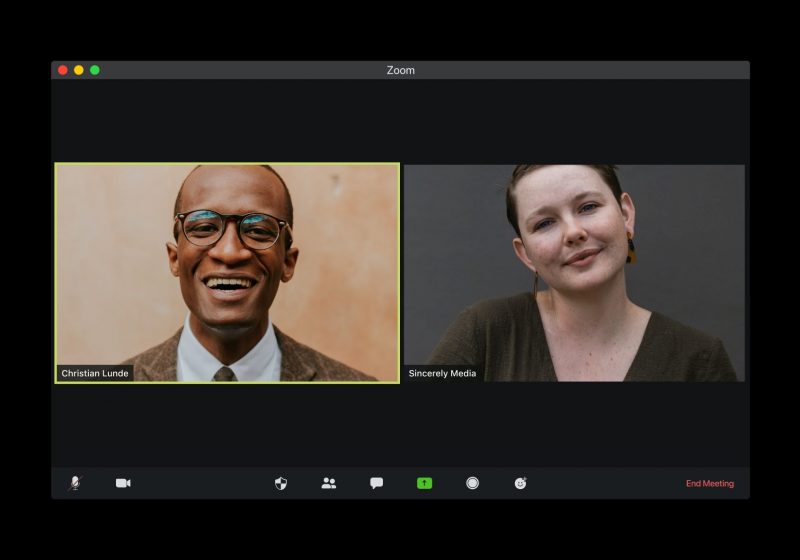 Screenshot of two people on a Zoom call to illustrate remote interviews